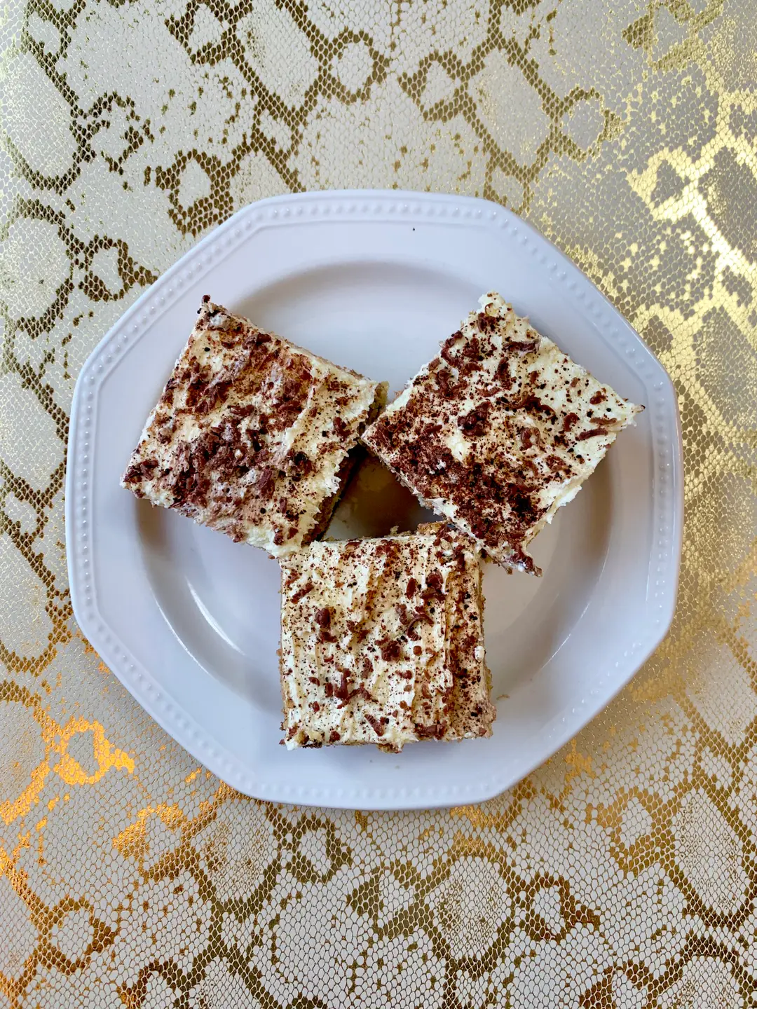 Three piece of honey cake on a plate